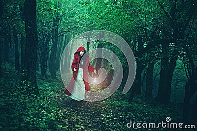 Little Red Riding Hood in the woods Stock Photo