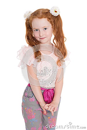 Little redhead fashionista in a jeans Stock Photo