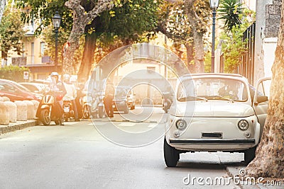 Little retro car on the street old vintage, beautiful summer day in Italy, travel tour Stock Photo