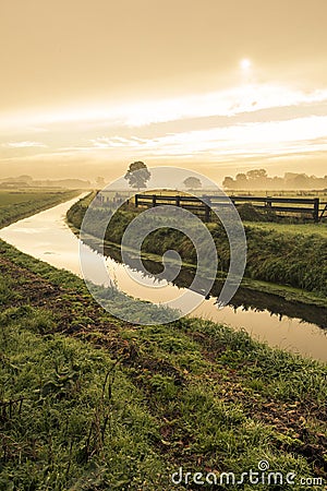 Little river in countryside at sunrise Stock Photo
