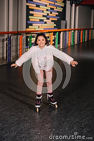 Little roller skater skating Stock Photo