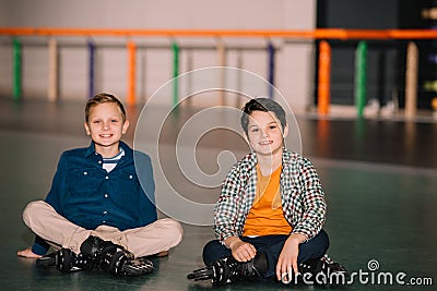 Little roller skaters looking at camera Stock Photo