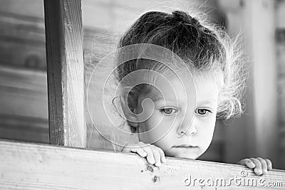 Little sad girl. Black and white series. Stock Photo