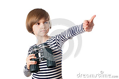 A little sailor with binocular points by a finger Stock Photo