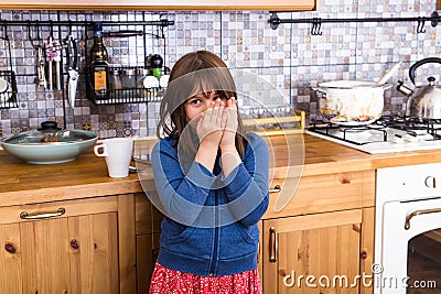 Little scared child girl hiding face. Fear concept. Stock Photo