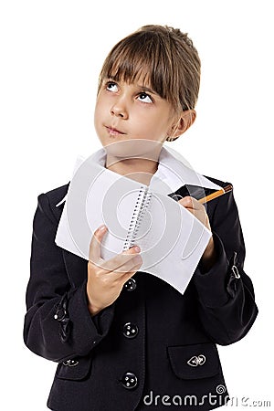 Little school girl in uniform Stock Photo