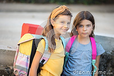 Little school girls outside. Looking at camera Stock Photo