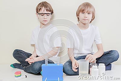 Little scientists preparing to make science experiments. Education concept. Stock Photo