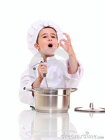 Little singing boy chef in uniform Stock Photo