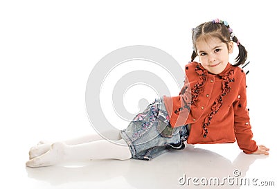 The little sitting girl isolated on a white Stock Photo