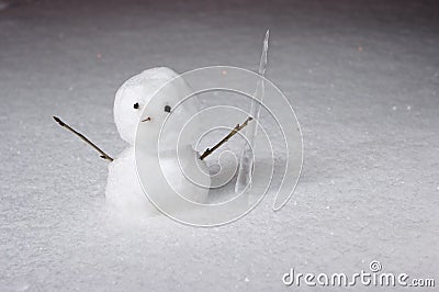 Little snowman with icicle Stock Photo