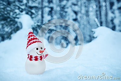 Little snowman on soft snow in the forest Stock Photo