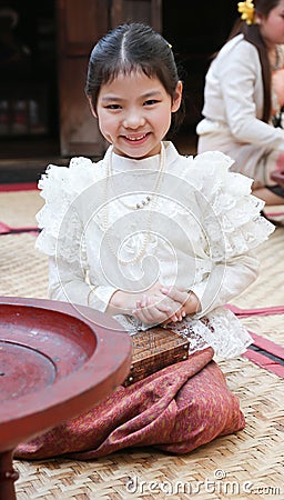 Little thai girl in a traditional costume Stock Photo