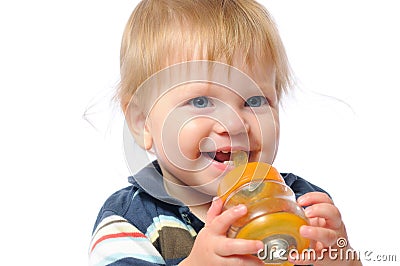 Little toddler drinks water from bottle Stock Photo