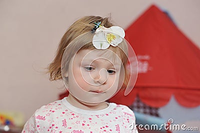 Little todler baby girl having fun indoor the room Stock Photo