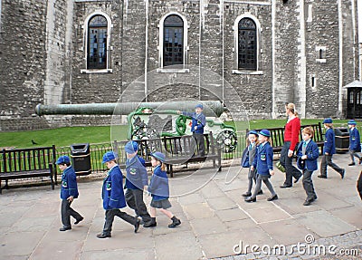 Little travelers in time with leader in London Tower Editorial Stock Photo