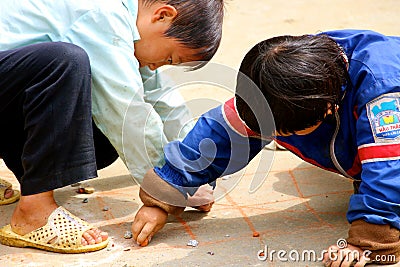 Little Vietnamese boys playing on the path Editorial Stock Photo