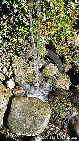 Little water fall water fall on the ground Stock Photo