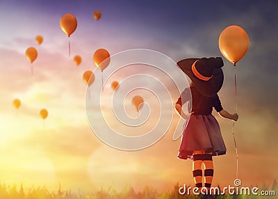 Little witch outdoors Stock Photo