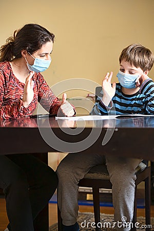 Boy doing homework Stock Photo