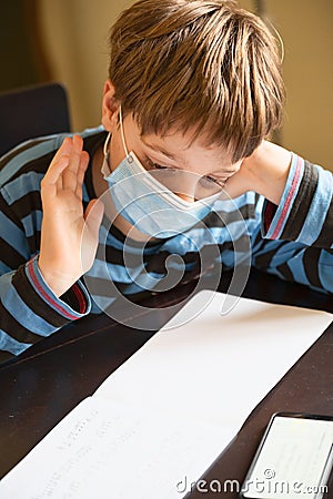 Boy doing homework Stock Photo