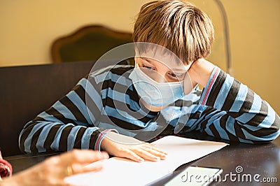 Boy doing homework Stock Photo