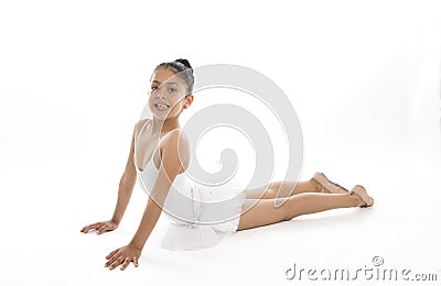 Little young cute girl ballet dancer dancing on white background Stock Photo