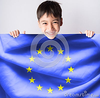 Littleboy taking european flag Stock Photo