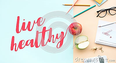 Live healthy concepts with text and red,green apple on desk worktable background Stock Photo