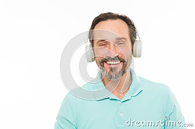 Live life loud. Mature man in stereo headphones. Happy bearded man listening to music via earphones. Elderly man Stock Photo