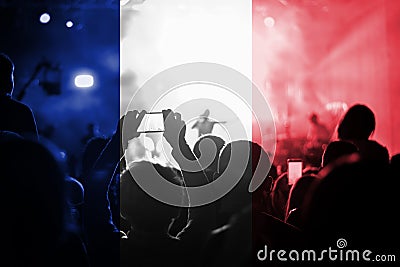 Live music concert with blending France flag on fans Stock Photo