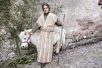 Live nativity scene played by local inhabitants. Reenactment of Jesus life with ancient crafts and customs of the past. Joseph wi Editorial Stock Photo