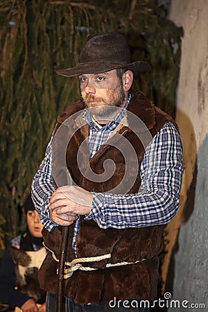 Live nativity scene played by local inhabitants. Reenactment of Jesus life with ancient crafts and customs of the past. A shephe Editorial Stock Photo