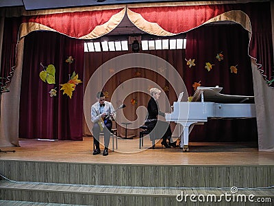 Live performance on the game on Russian folk instruments in the city of Kaluga. Editorial Stock Photo