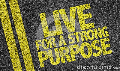 Live For a Strong Purpose written on the road Stock Photo