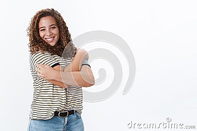 Lively confident carefree chubby cute girlfriend hugging herself accepting own diversity beauty stand body-positive Stock Photo