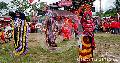Lively healthy walking festival and performances of reog, lumping horse and lion dance Editorial Stock Photo