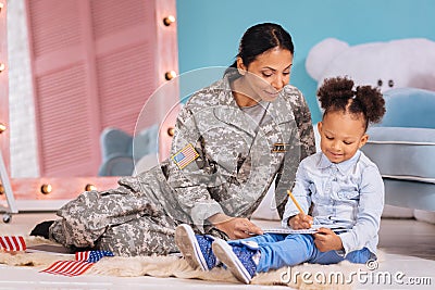 Lively patriotic family working on inspiring essay Stock Photo