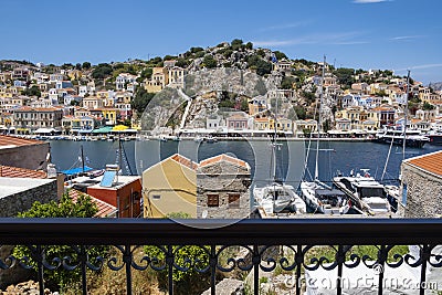 Beautiful View of Port of Symi Greece from a Balcony Stock Photo