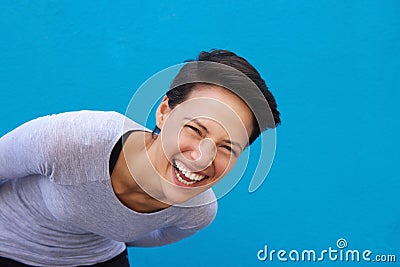 Lively young woman laughing Stock Photo
