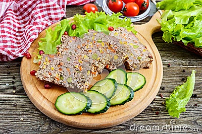 Liver casserole. Useful dish from the liver. Freshly baked pork liver souffle with rice and vegetables Stock Photo