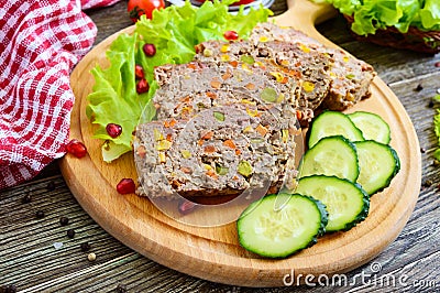 Liver casserole. Useful dish from the liver. Freshly baked pork liver souffle with rice and vegetables Stock Photo