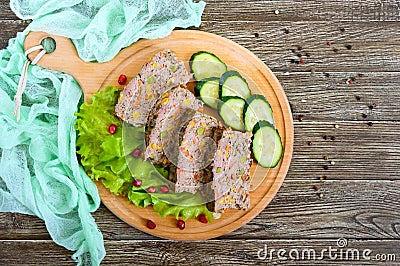 Liver casserole. Useful dish from the liver. Freshly baked pork liver souffle with rice and vegetables Stock Photo