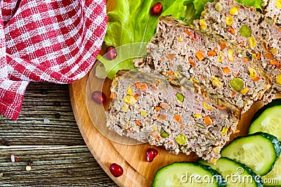 Liver casserole. Useful dish from the liver. Freshly baked pork liver souffle with rice and vegetables Stock Photo