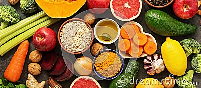 Liver detox diet food concept, fruits, vegetables, nuts, olive oil, garlic. Cleansing the body, healthy eating. Top view, flat lay Stock Photo