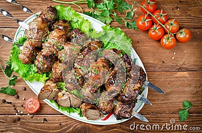 Liver kebab wrapped in bacon Stock Photo