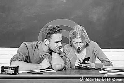 Living in digital age. Home schooling. Couple of man and woman in classroom. Back to school. Modern school. Knowledge Stock Photo