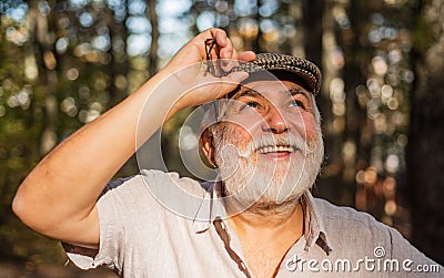 Living happy life. Meaning of life. Elderly people care. Nursing home. True values. Pensioner relax autumn nature Stock Photo