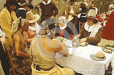 Living history reenactment of Pilgrims and Indians dining on Plymouth Plantation, Plymouth, MA Editorial Stock Photo