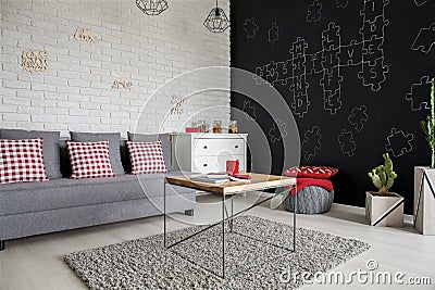 Living room with blackboard wall Stock Photo